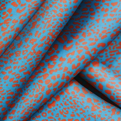 Tejido lycra para bikini con estampado animal print azul